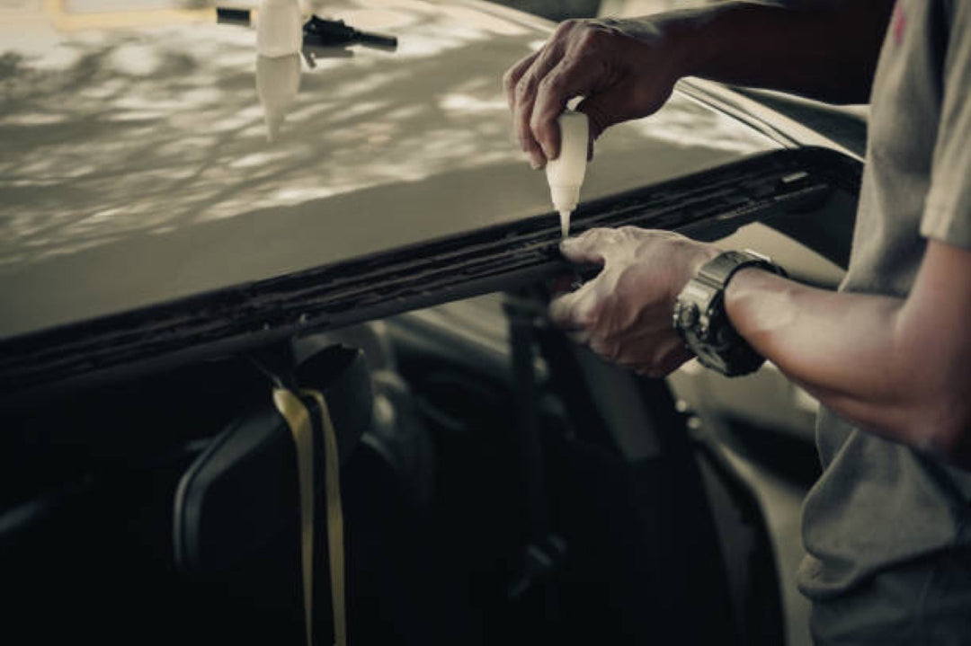 Auto Glass Repair Rosemead technician inspecting windshield